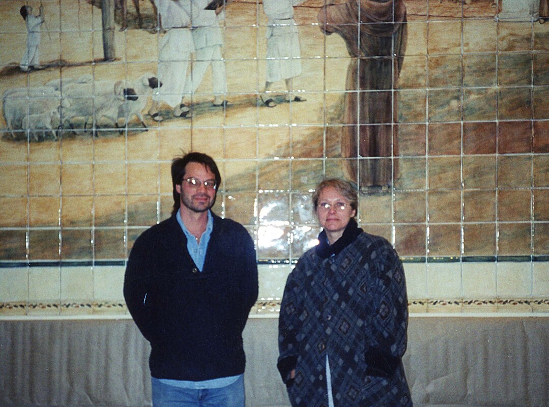 Frank and Jamie Santaniello oversee the "Mission San Juan Capistrano Mural" installation at Kaiser Permanente Medical facility in San Juan Capistrano in the year 2000.